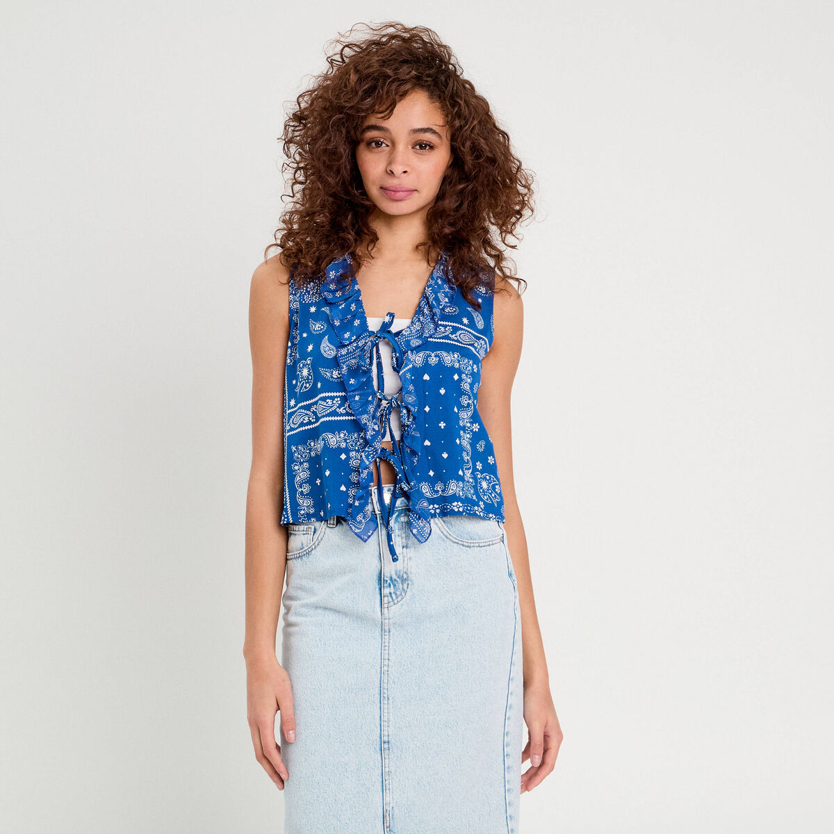 Blouse nouée sans manches bleu femme