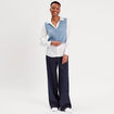 Pull sans manches col en V bleu pastel femme