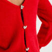 Pull d&eacute;tails coeur rouge femme