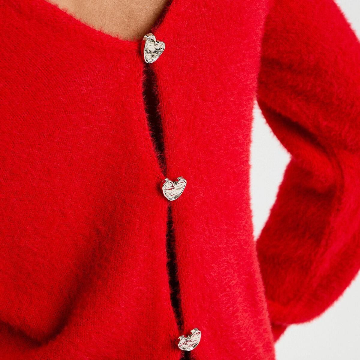 Pull d&eacute;tails coeur rouge femme