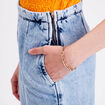 Jeans large zippé denim bleach femme