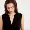 Blouse sans manches col tunisien pliss&eacute; noir femme