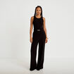 Combinaison large sans manches ceintur&eacute;e noir femme