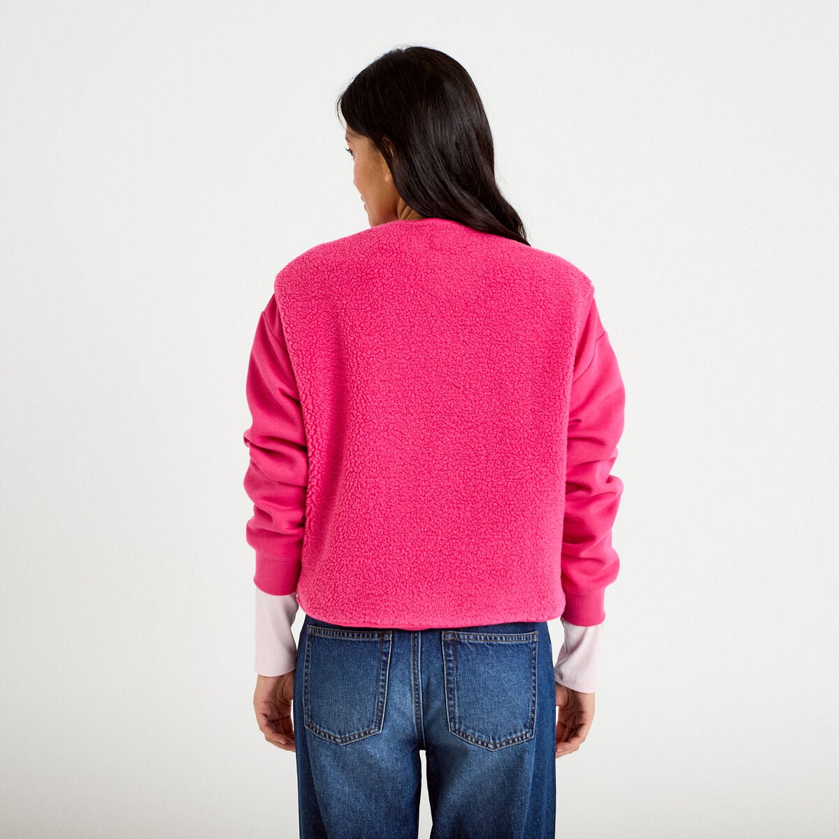 Gilet sans manches effet polaire col v rose fushia femme