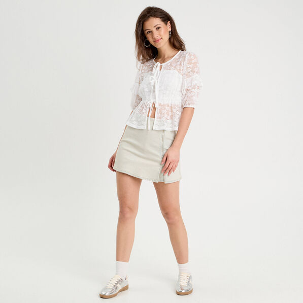 Jupe-short trapèze en jean denim bleach femme