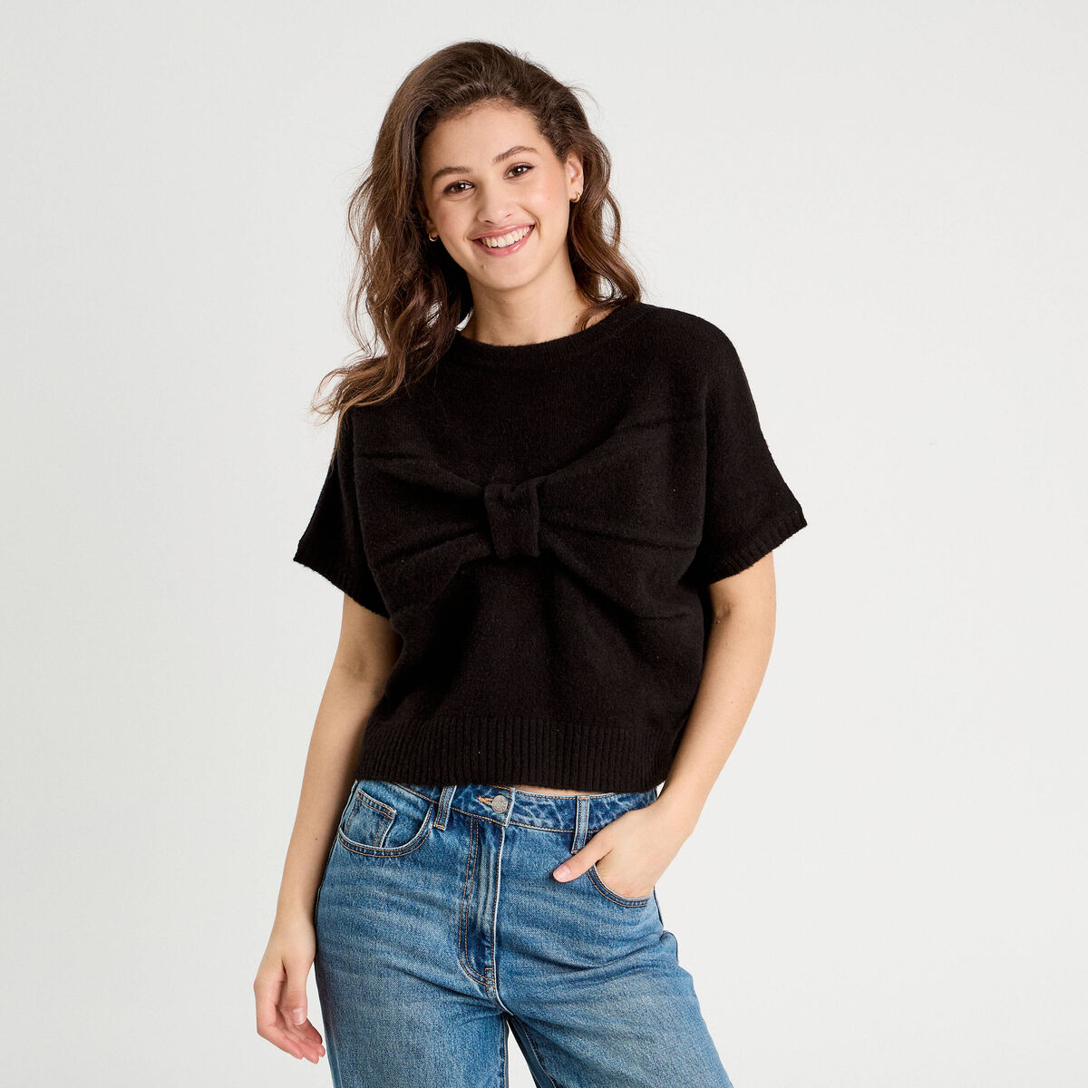 Pull dos devant détail noeud noir femme