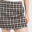 Jupe-short trap&egrave;ze tweed noir femme