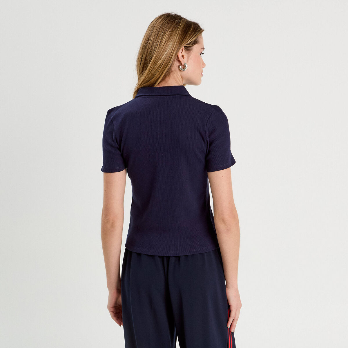 Polo manches courtes zippé bleu marine femme