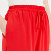 Pantalon large fluide rouge fluo femme