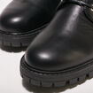 Bottes hautes plates à lacets noir femme