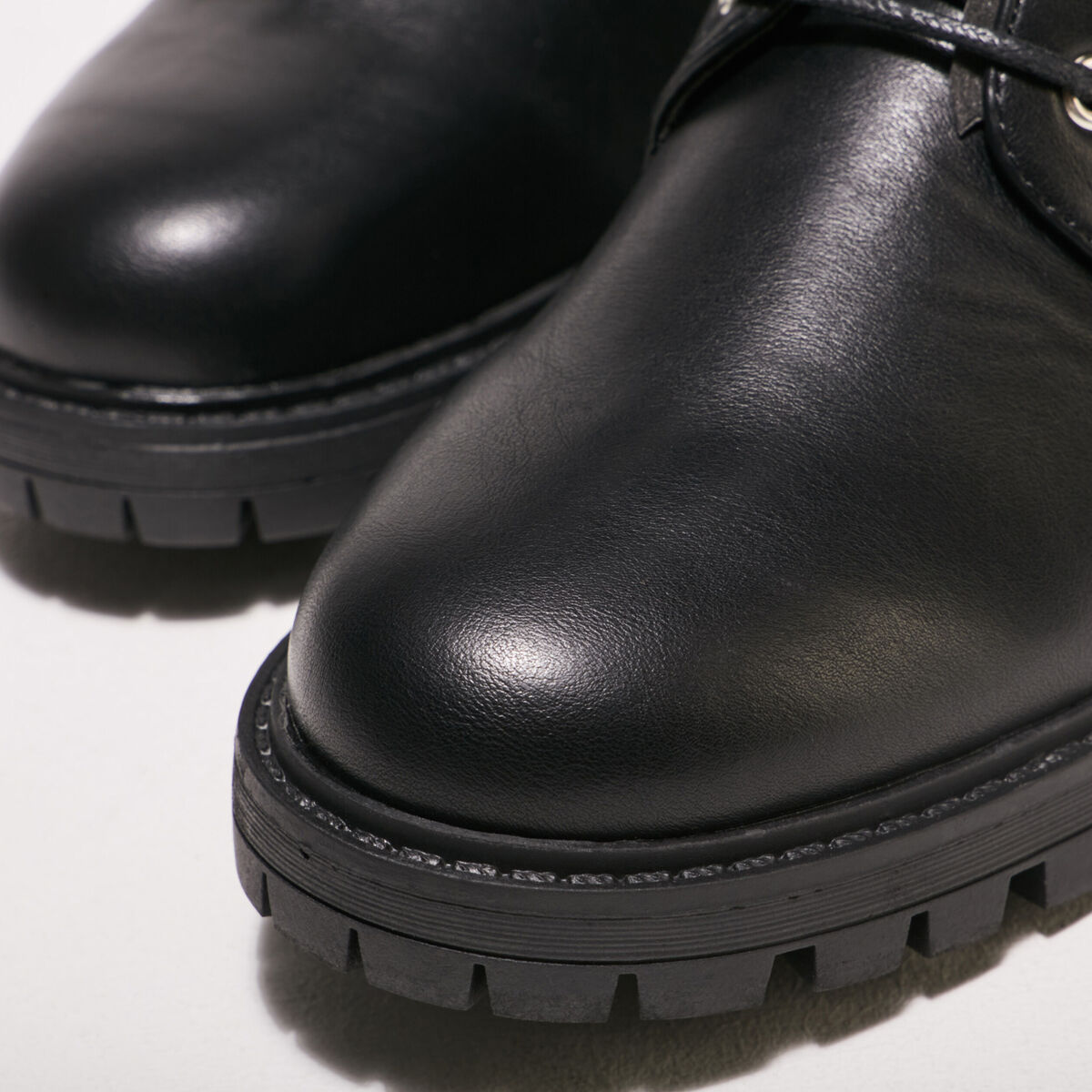 Bottes hautes plates à lacets noir femme