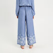 Pantalon large brodé bleu femme