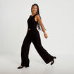 Combinaison large sans manches ceintur&eacute;e noir femme
