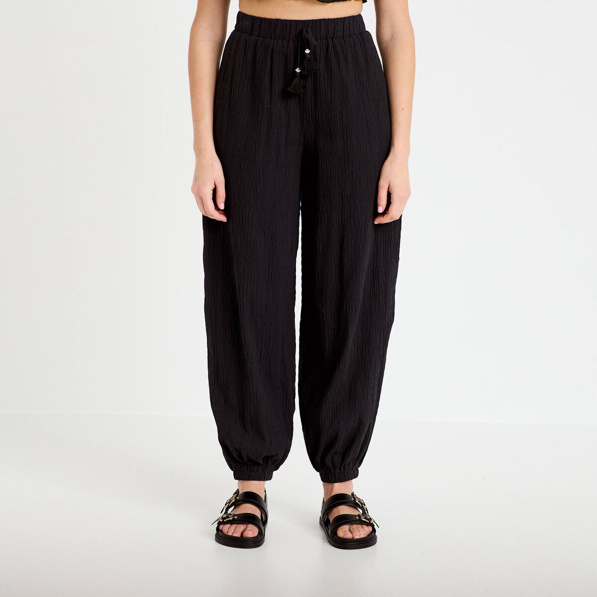 Pantalon large taille haute pliss&eacute; noir femme