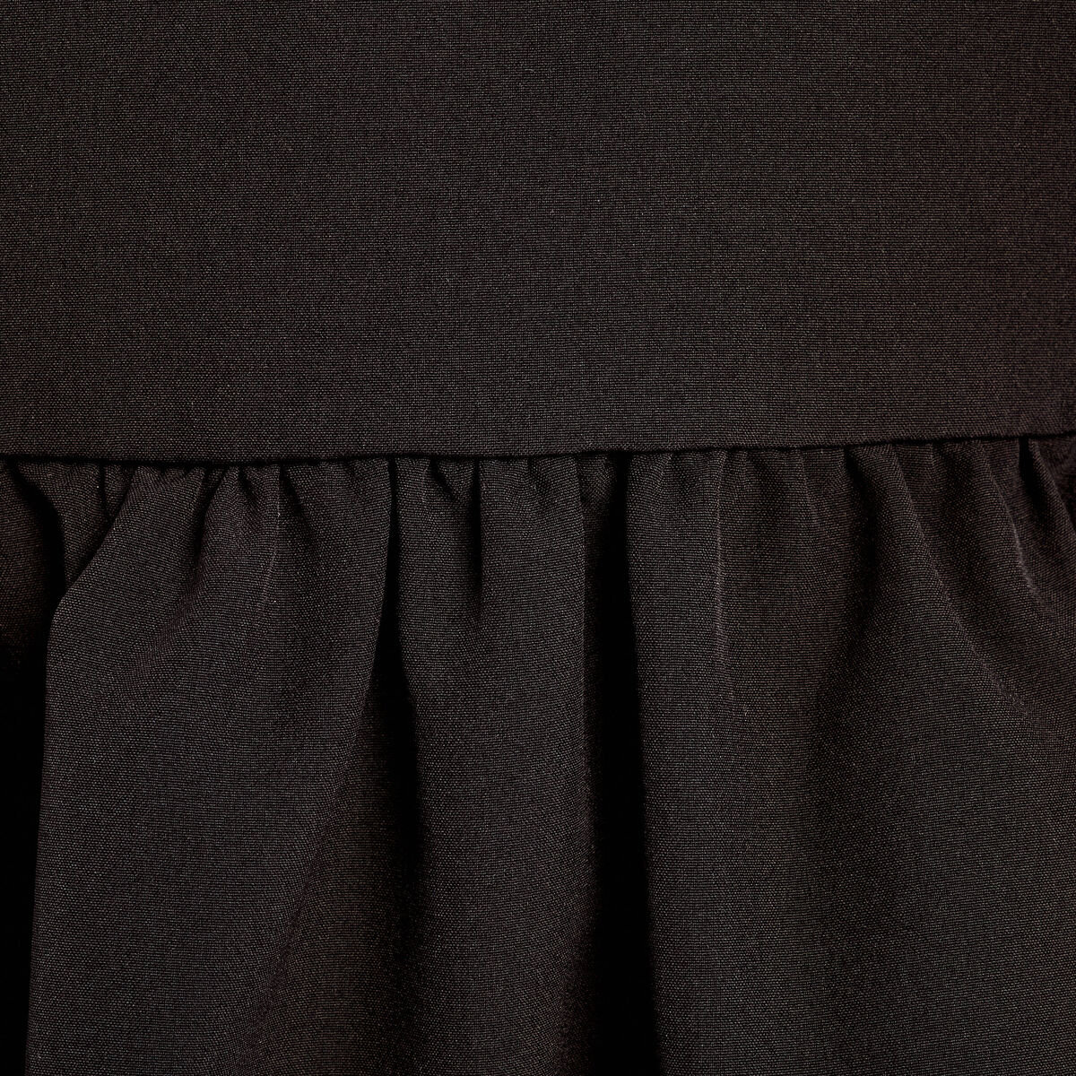 Blouse effet boule et noeud noir femme