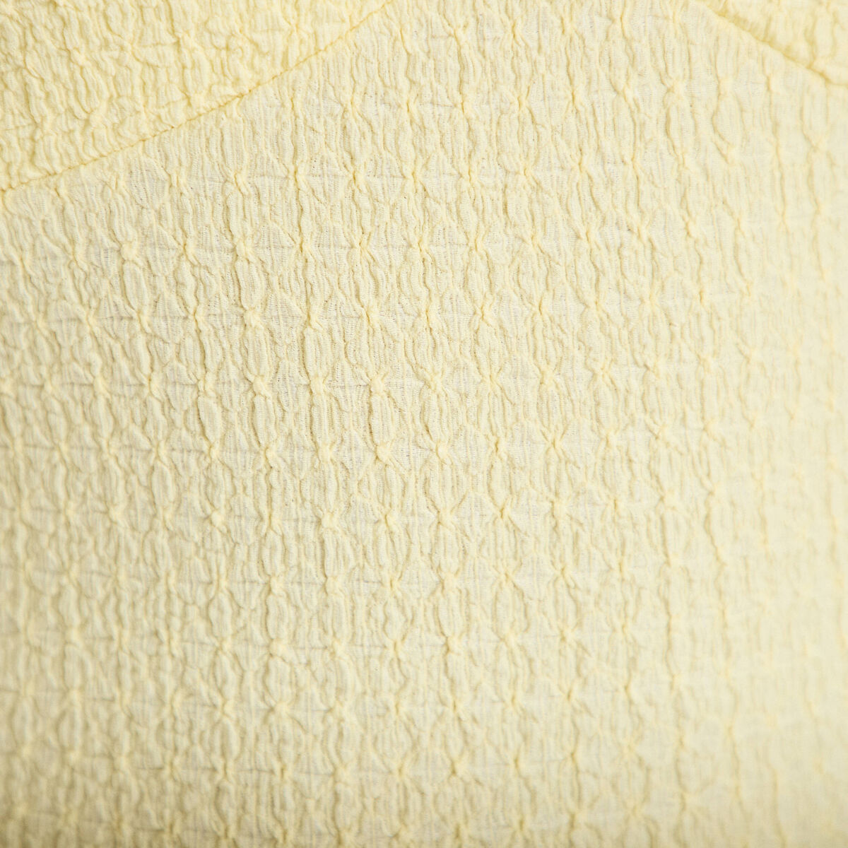 Top cintr&eacute; sans manches avec relief jaune pastel femme
