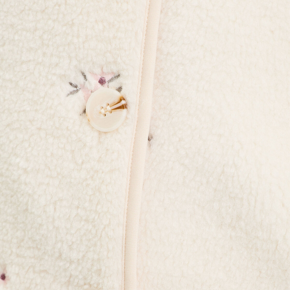 Gilet sans manches brod&eacute; effet polaire blanc femme