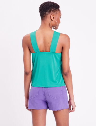 D&eacute;bardeur col avec anneau vert femme
