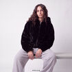 Blouson capuche fausse fourrure noir