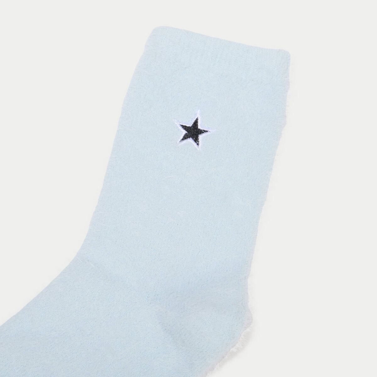 Chaussettes duveteuses bleu ciel