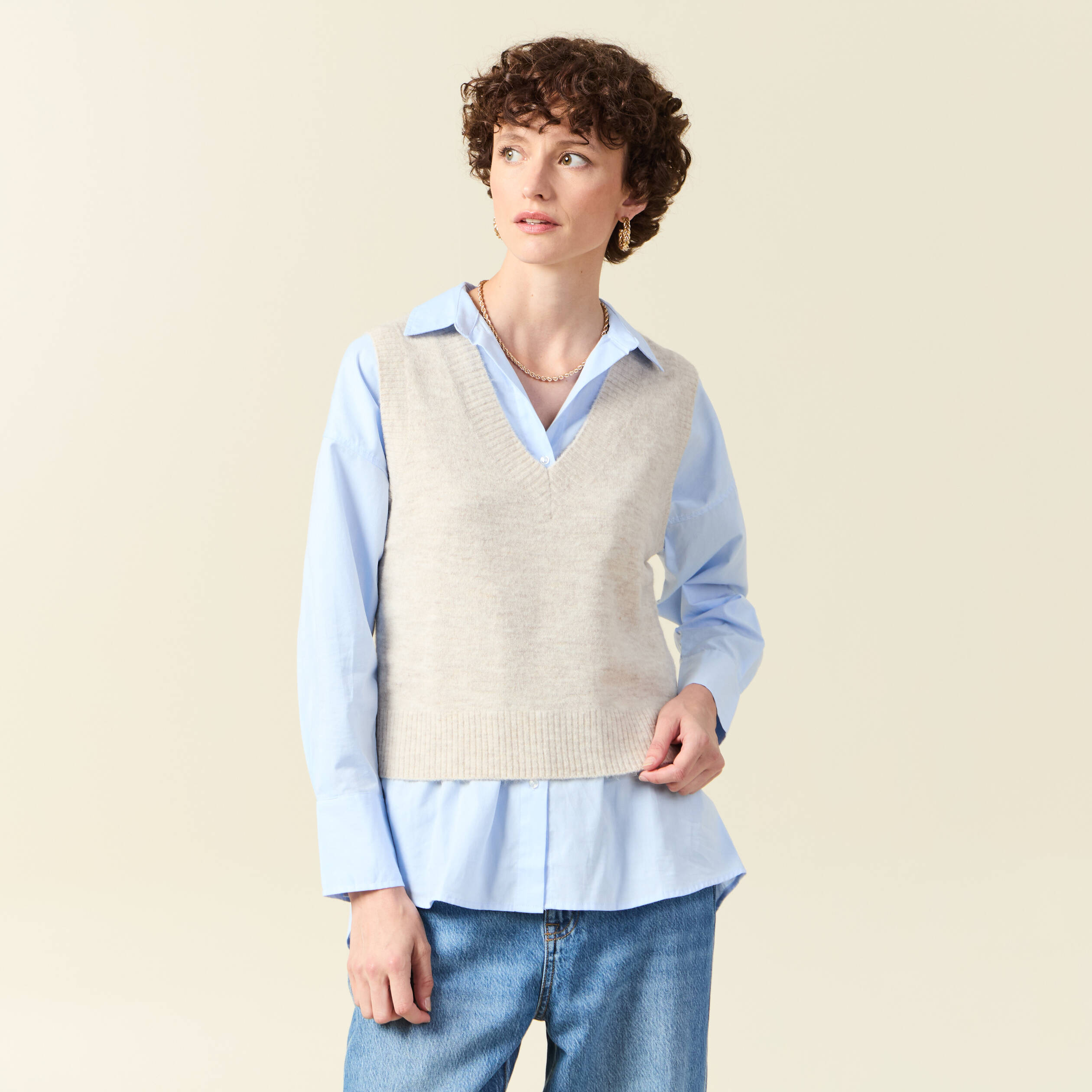 Pull sans manches col en V creme femme