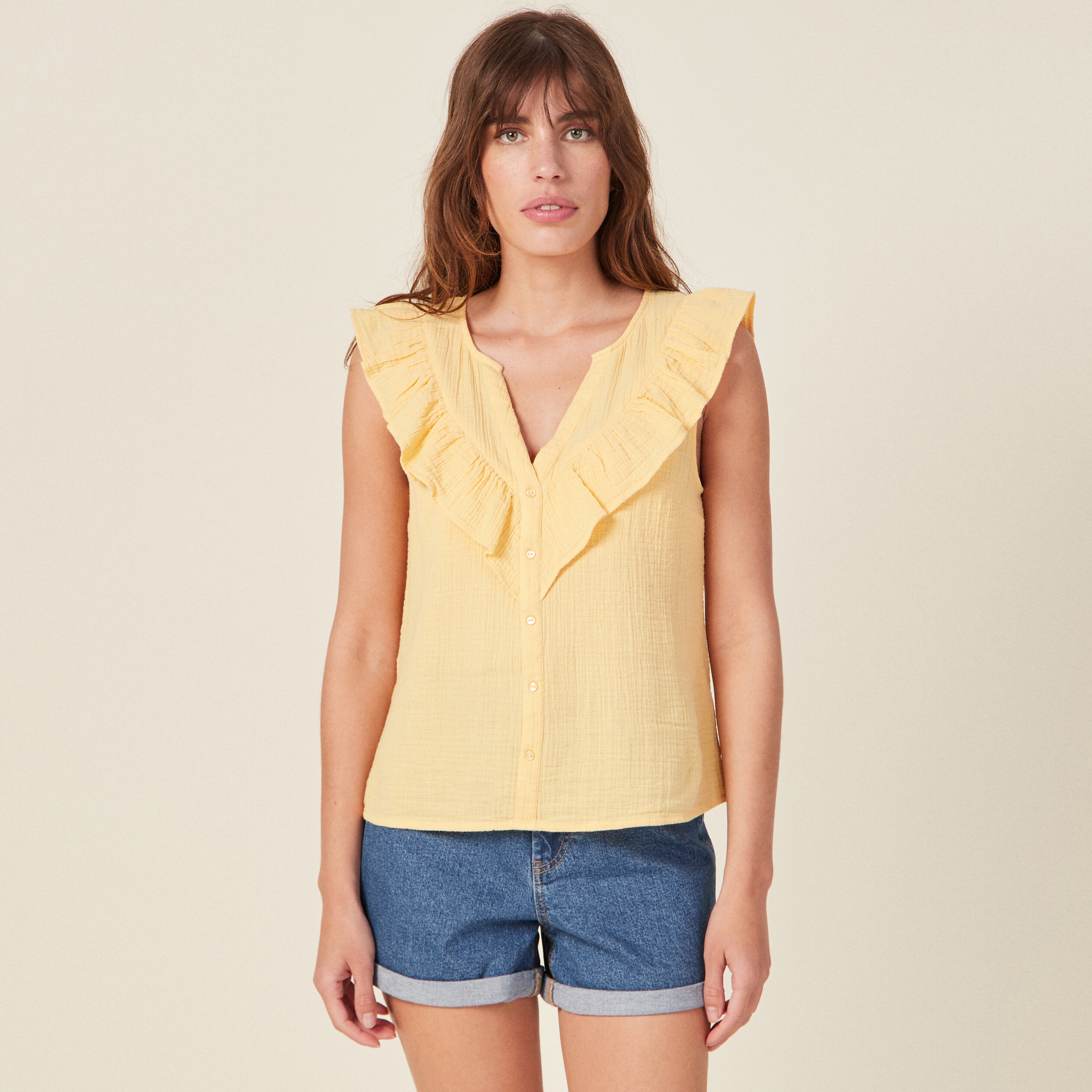 Chemise sans manches à volants jaune clair femme