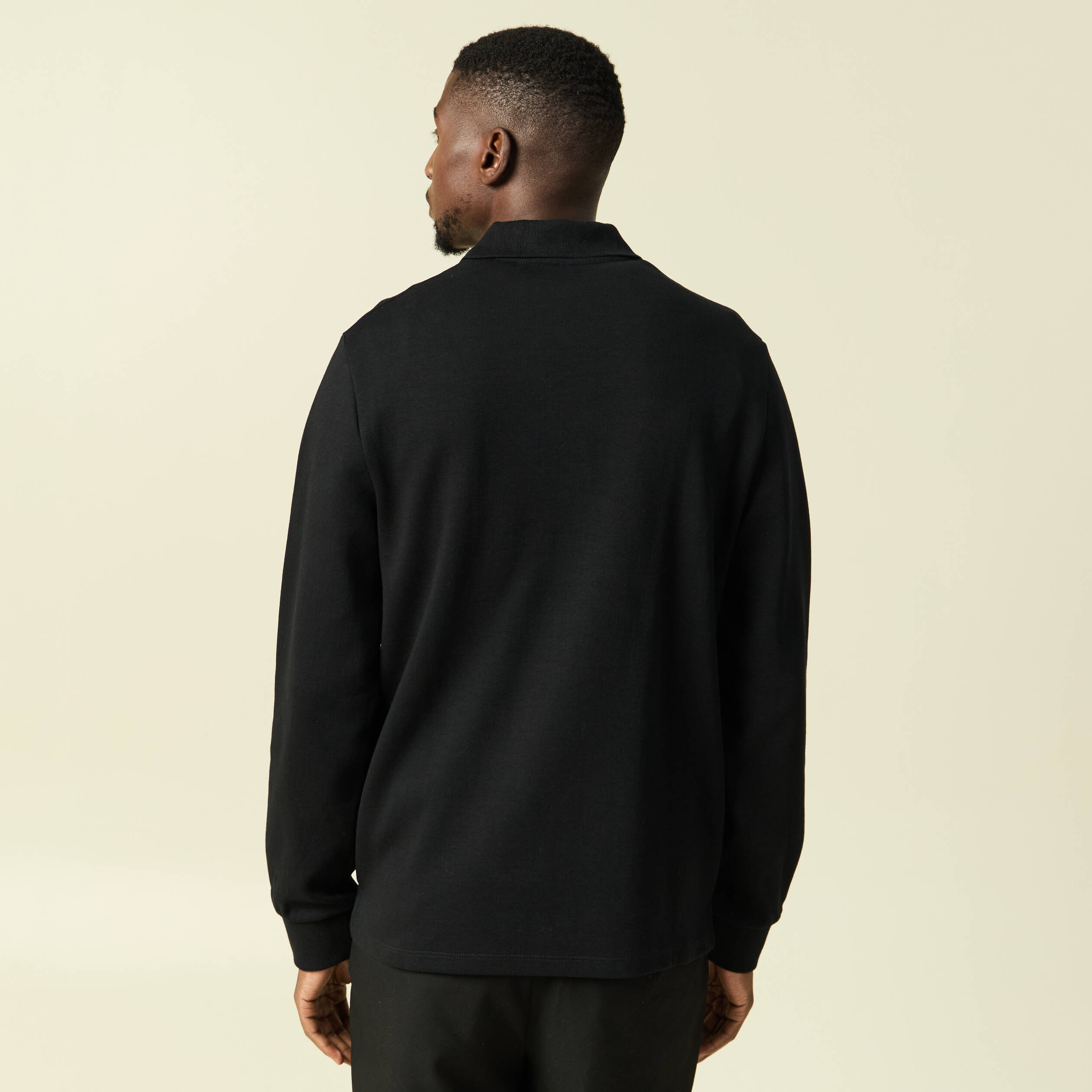 Polo cintr&eacute; manches longues en coton noir homme
