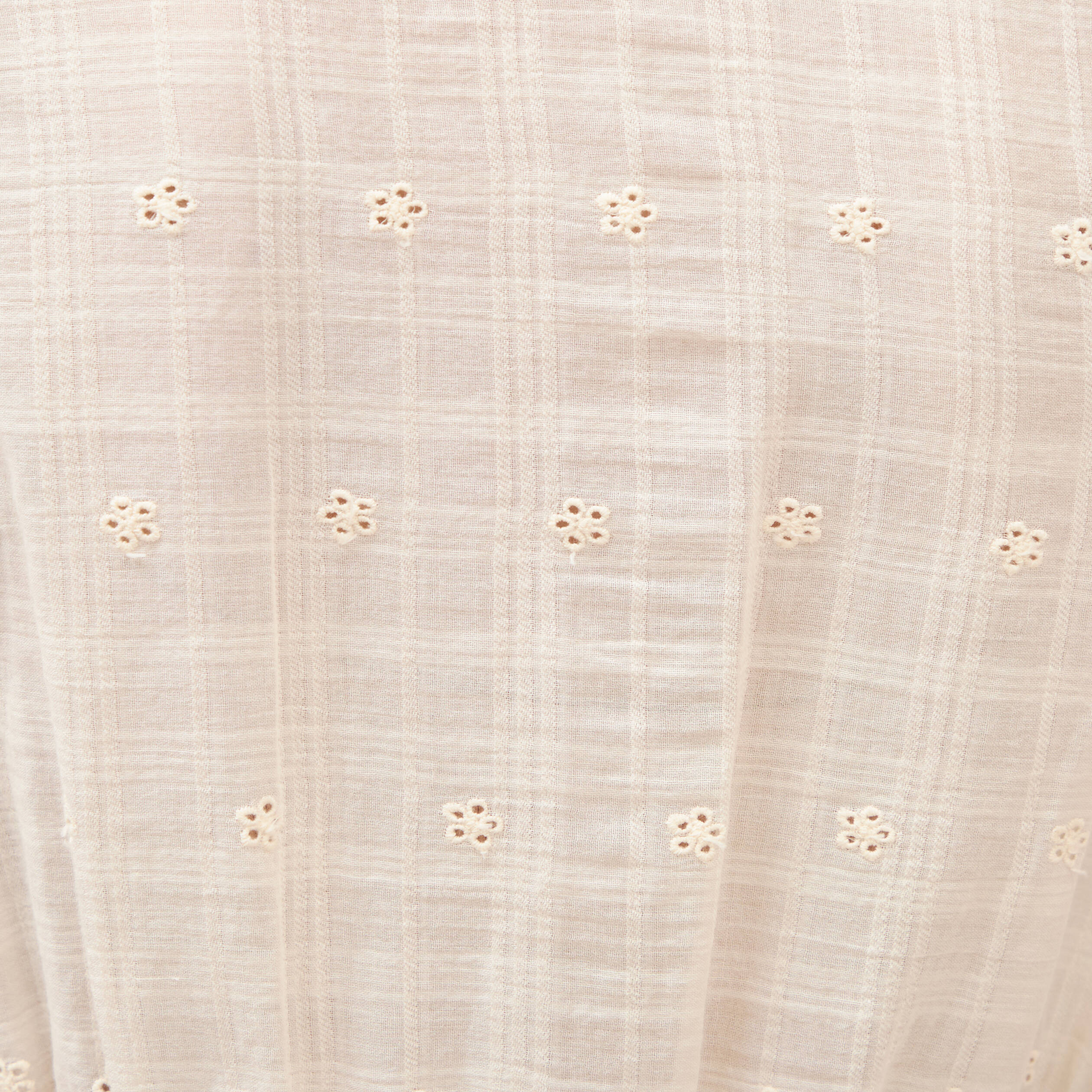 Top col v sans manches en coton creme femme