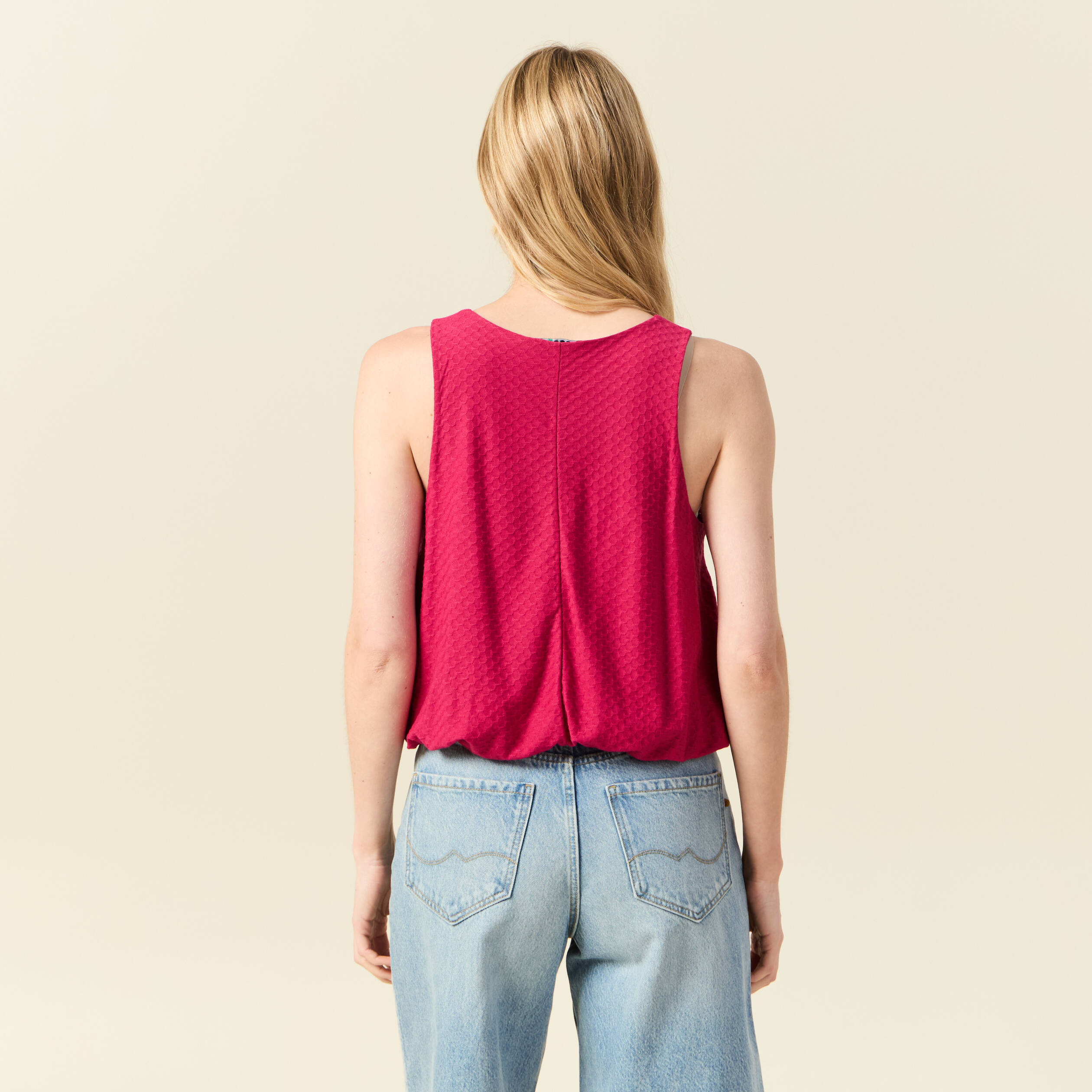 D&eacute;bardeur sans manches rose framboise femme