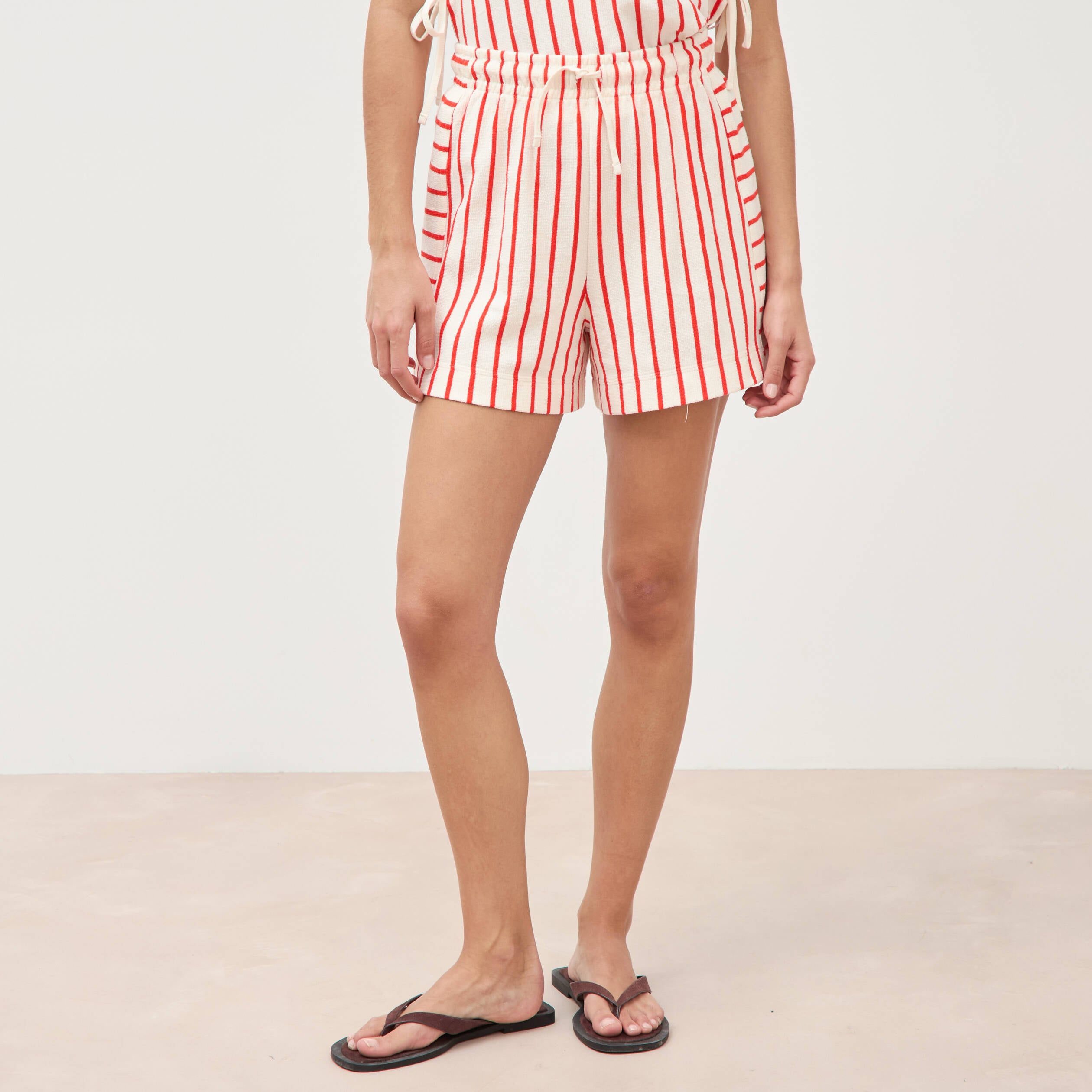 Short taille haute en maille ray&eacute;e orange fonc&eacute; femme