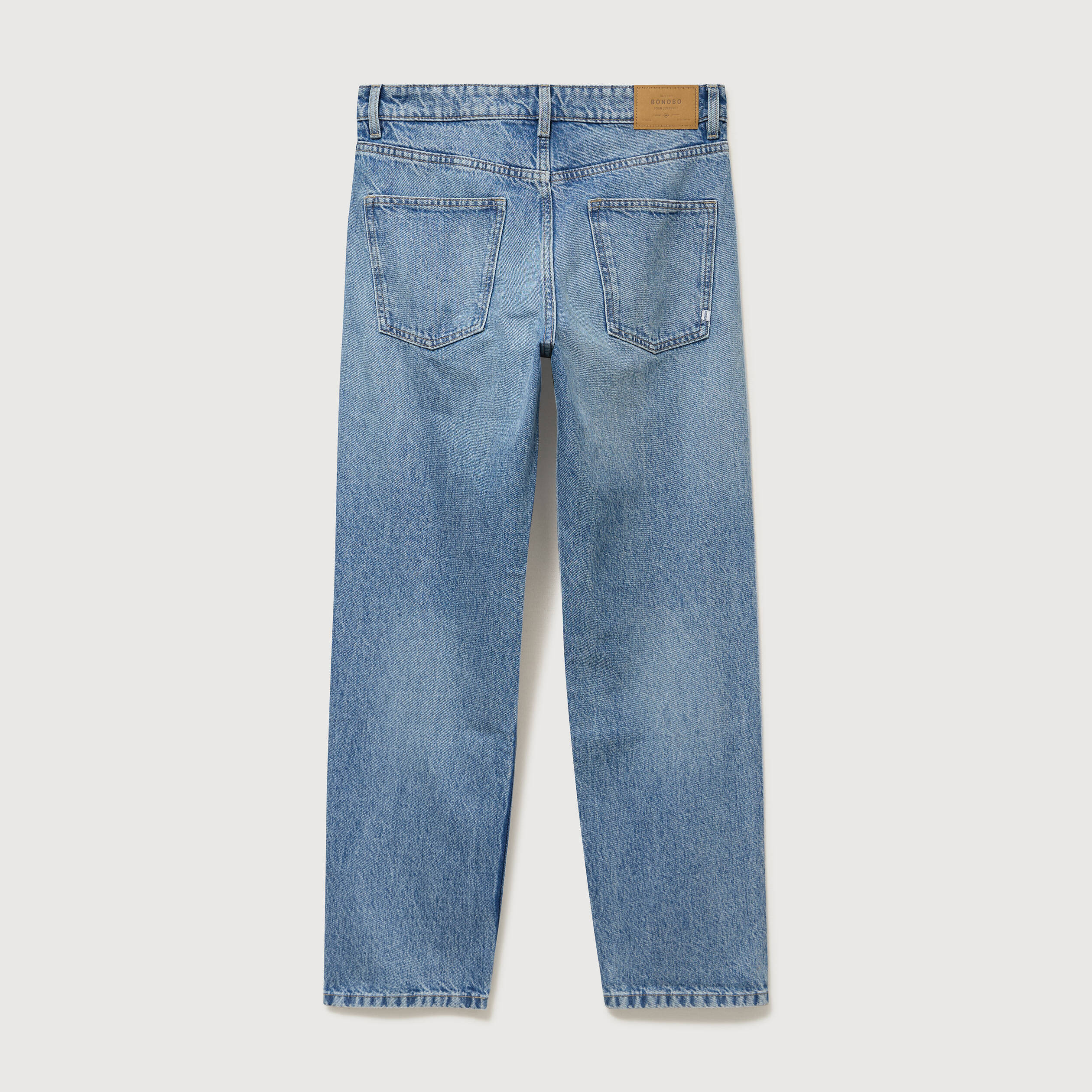 Jeans large longueur 34 en coton denim bleach homme