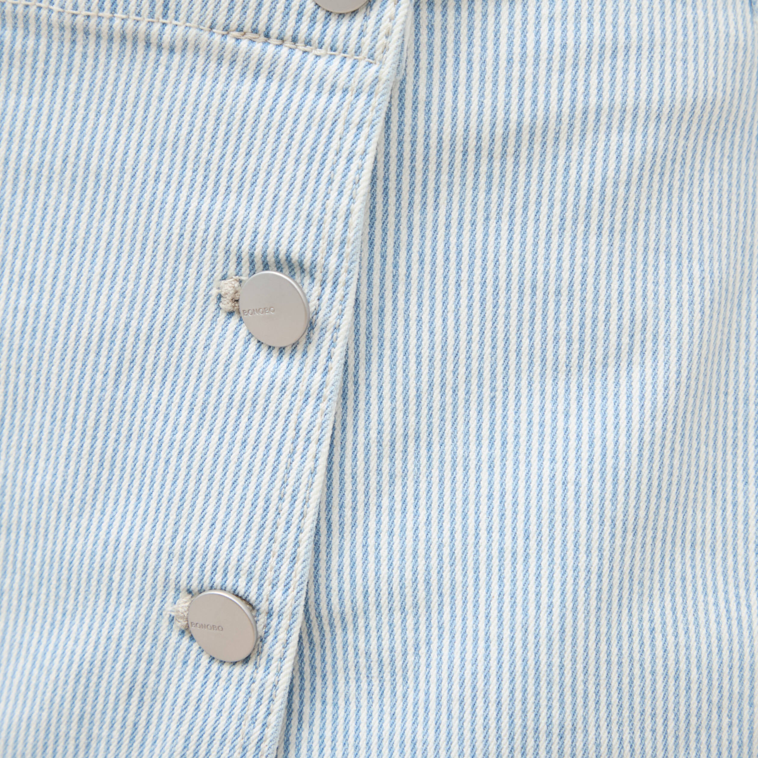 Jupe-short taille haute en jeans denim bleach femme