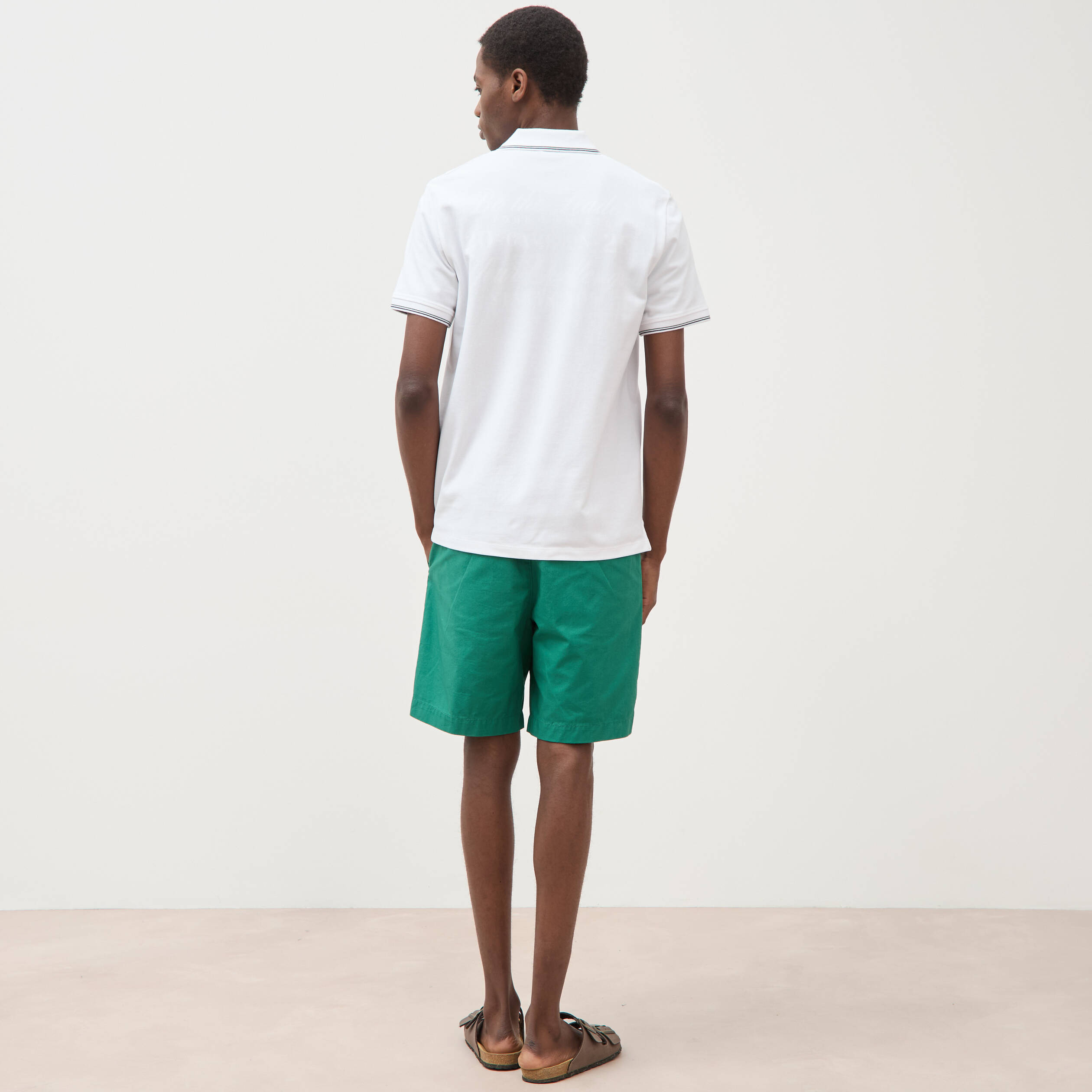 Polo cintr&eacute; en coton manches courtes blanc homme
