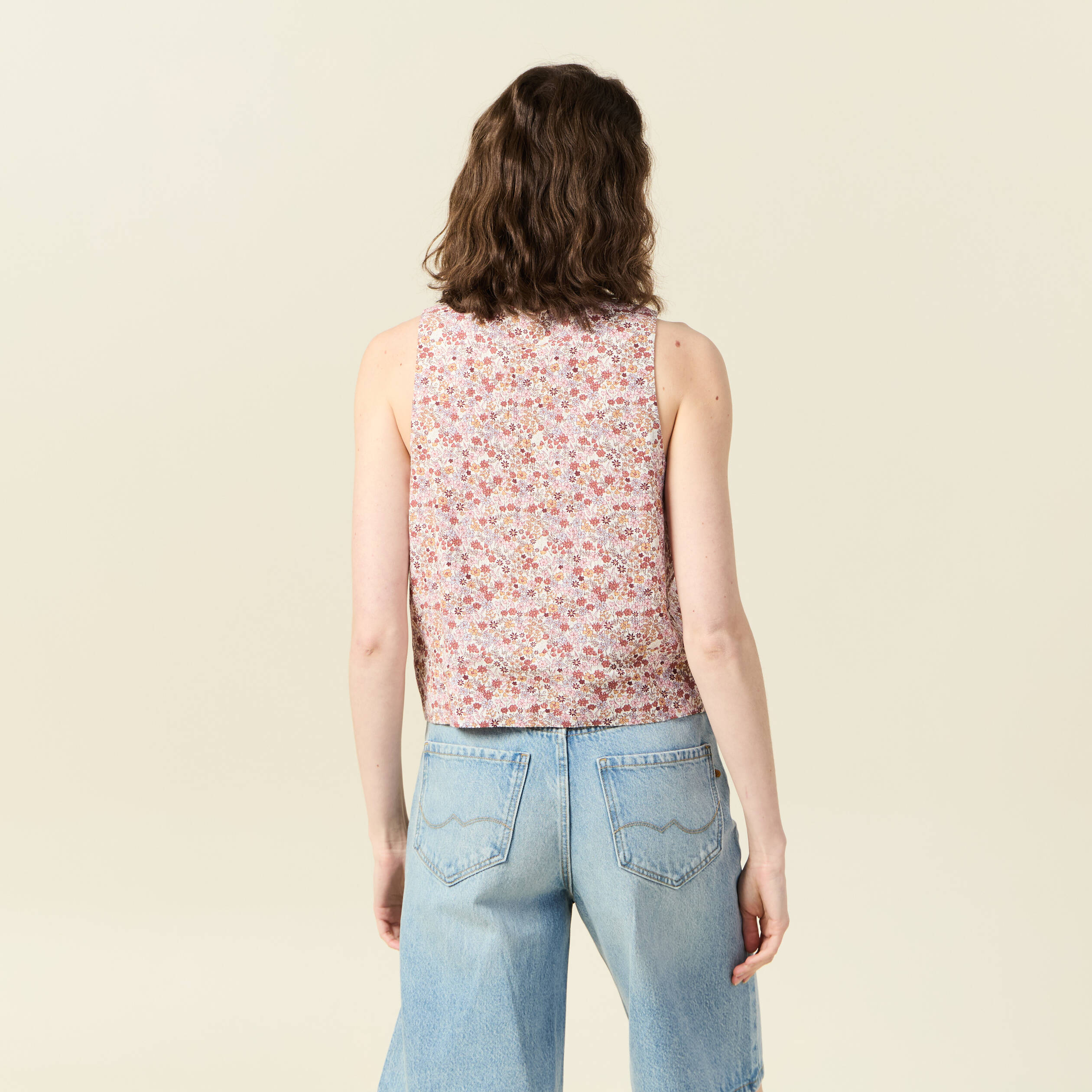 gilet sans manches noue ivoire femme Gilet sans manches noué ivoire femme