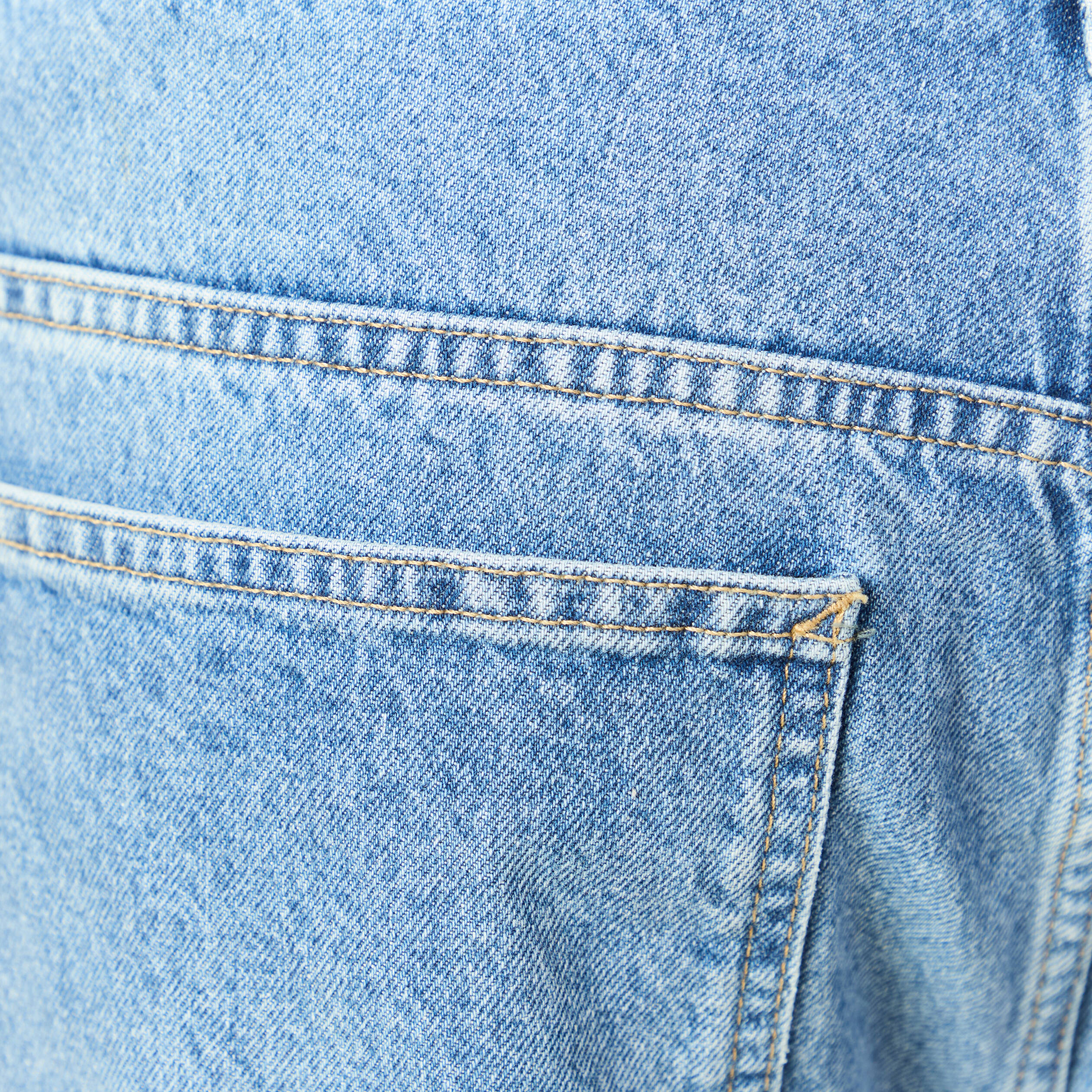 Jeans loose longueur 32 en coton denim bleach homme