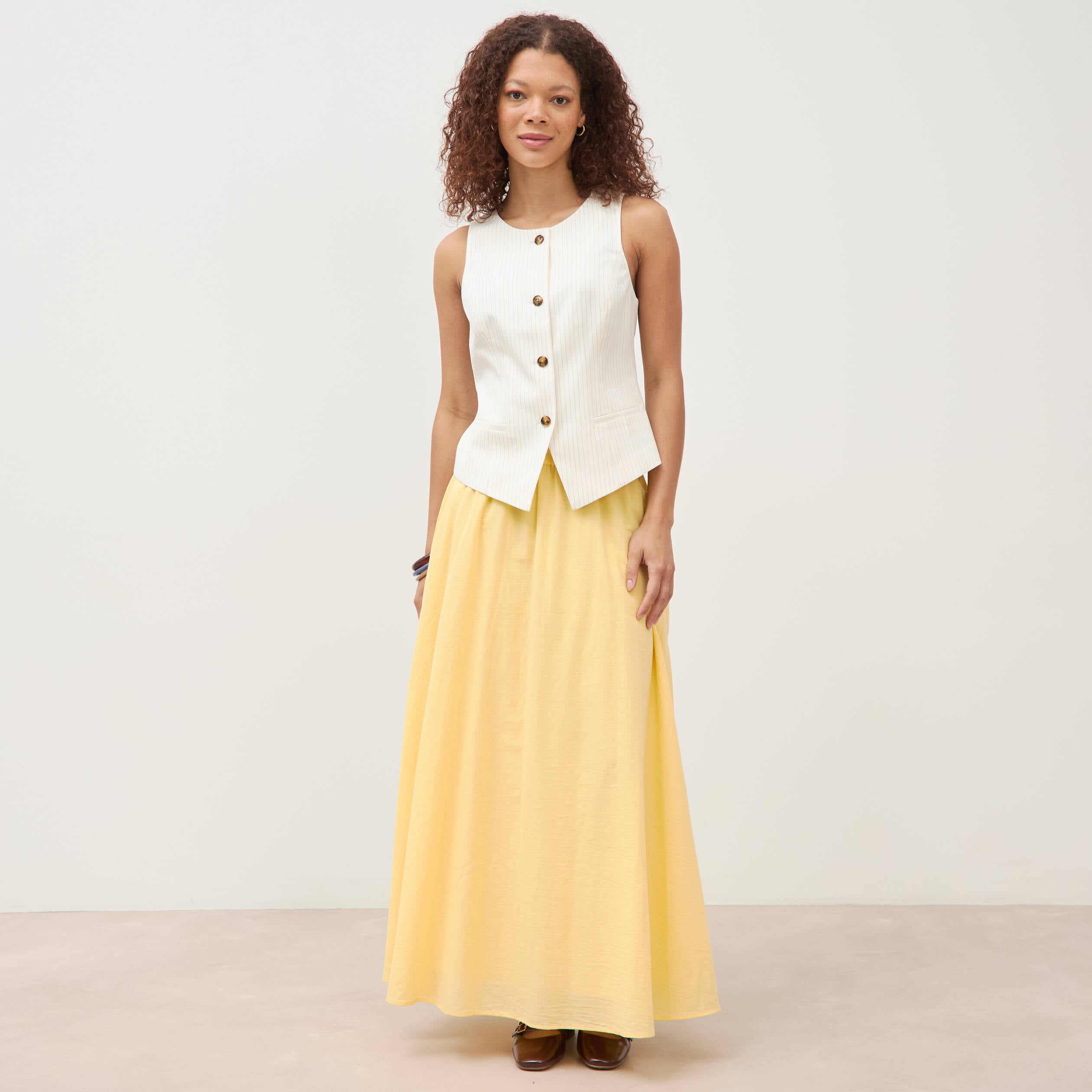 Gilet sans manches col rond doubl&eacute; ivoire femme