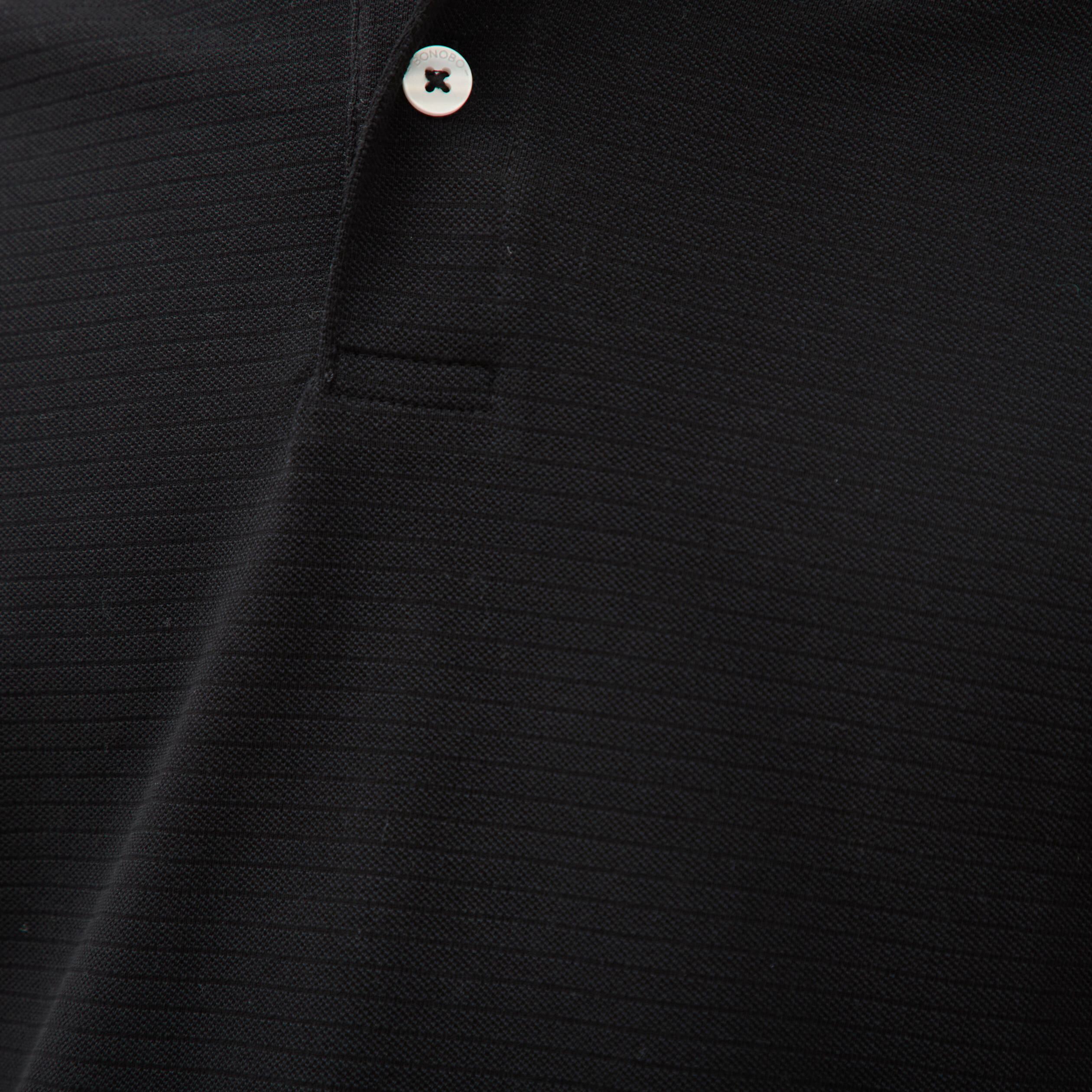 Polo cintr&eacute; en coton manches courtes noir homme