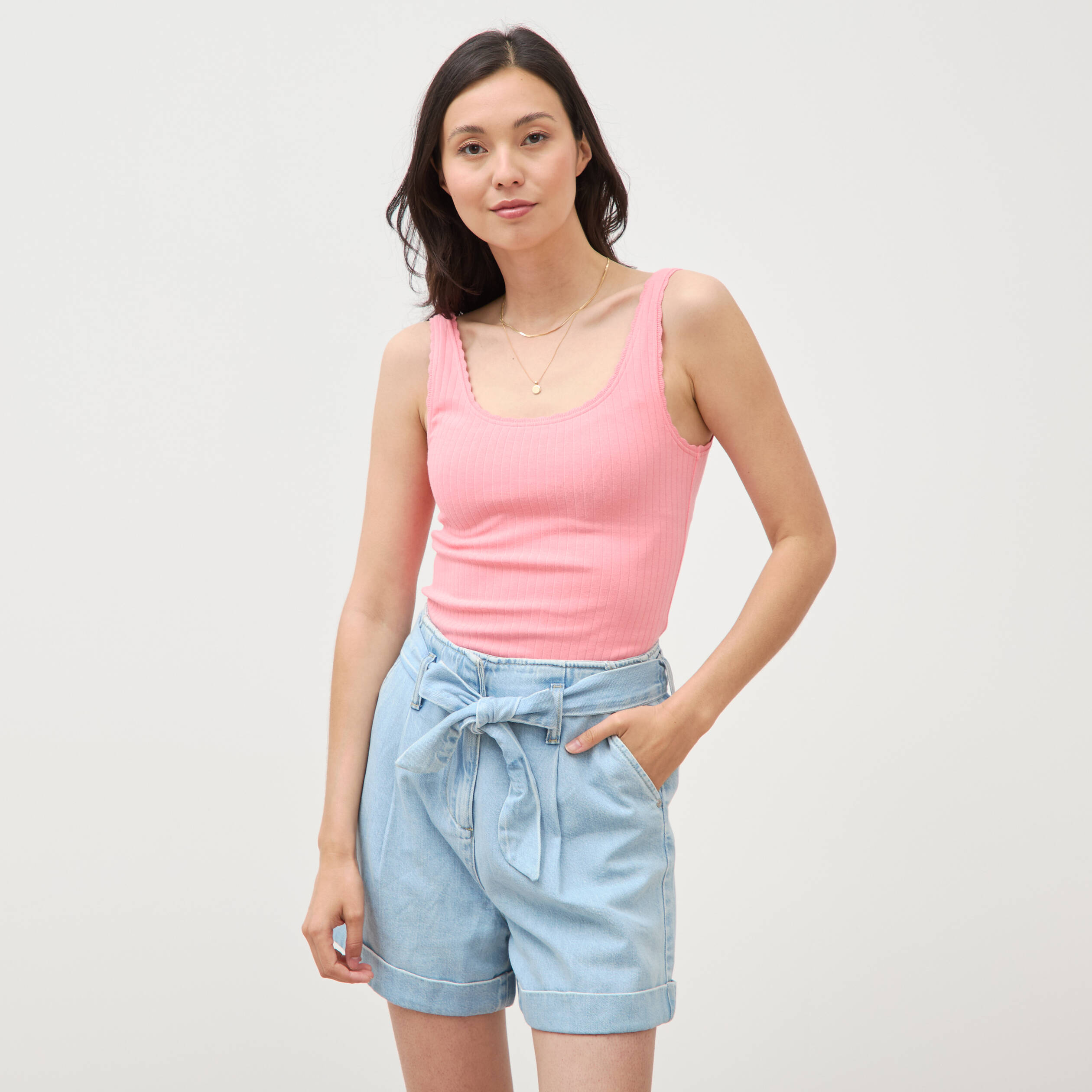 D&eacute;bardeur sans manches c&ocirc;tel&eacute; rose femme
