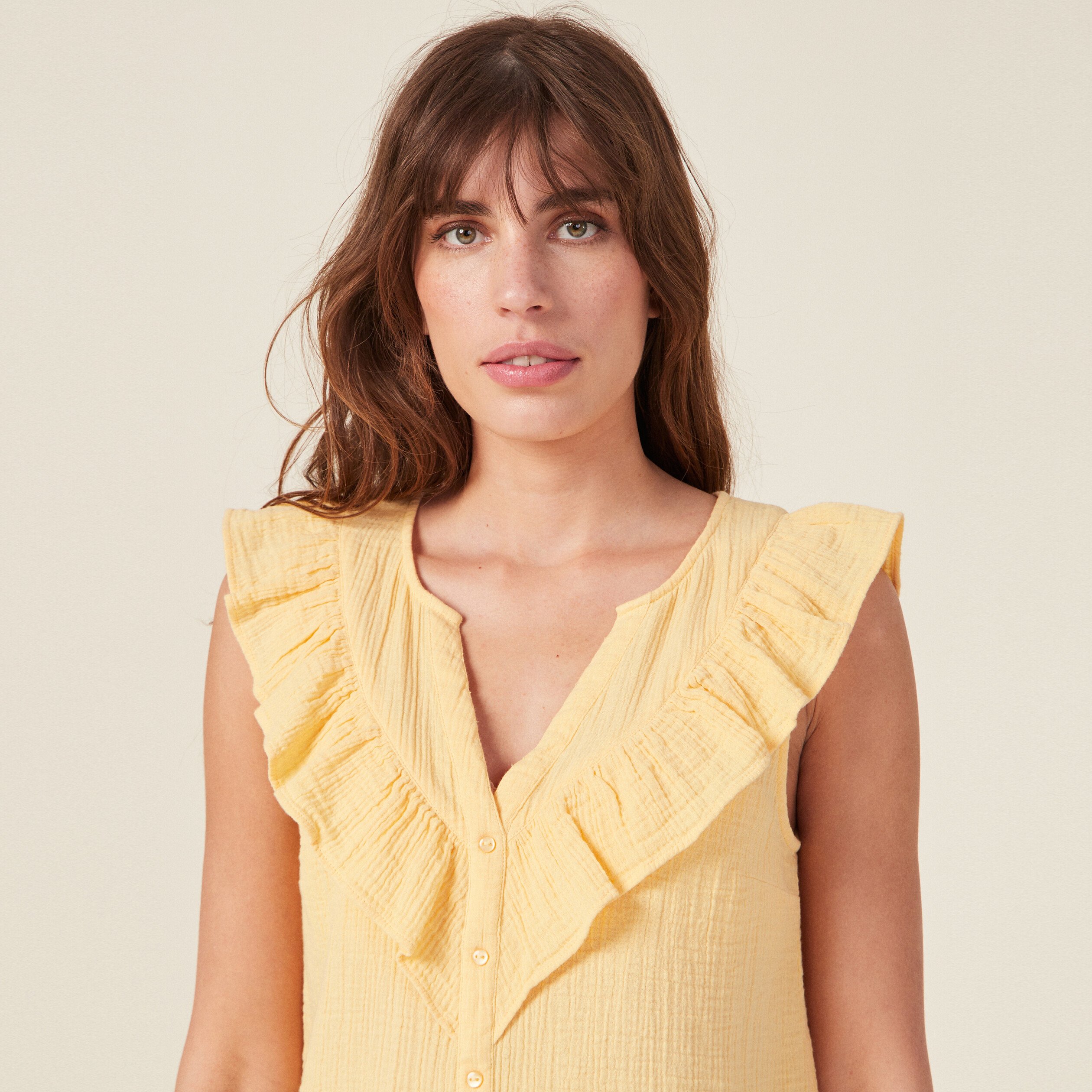 Chemise sans manches à volants jaune clair femme