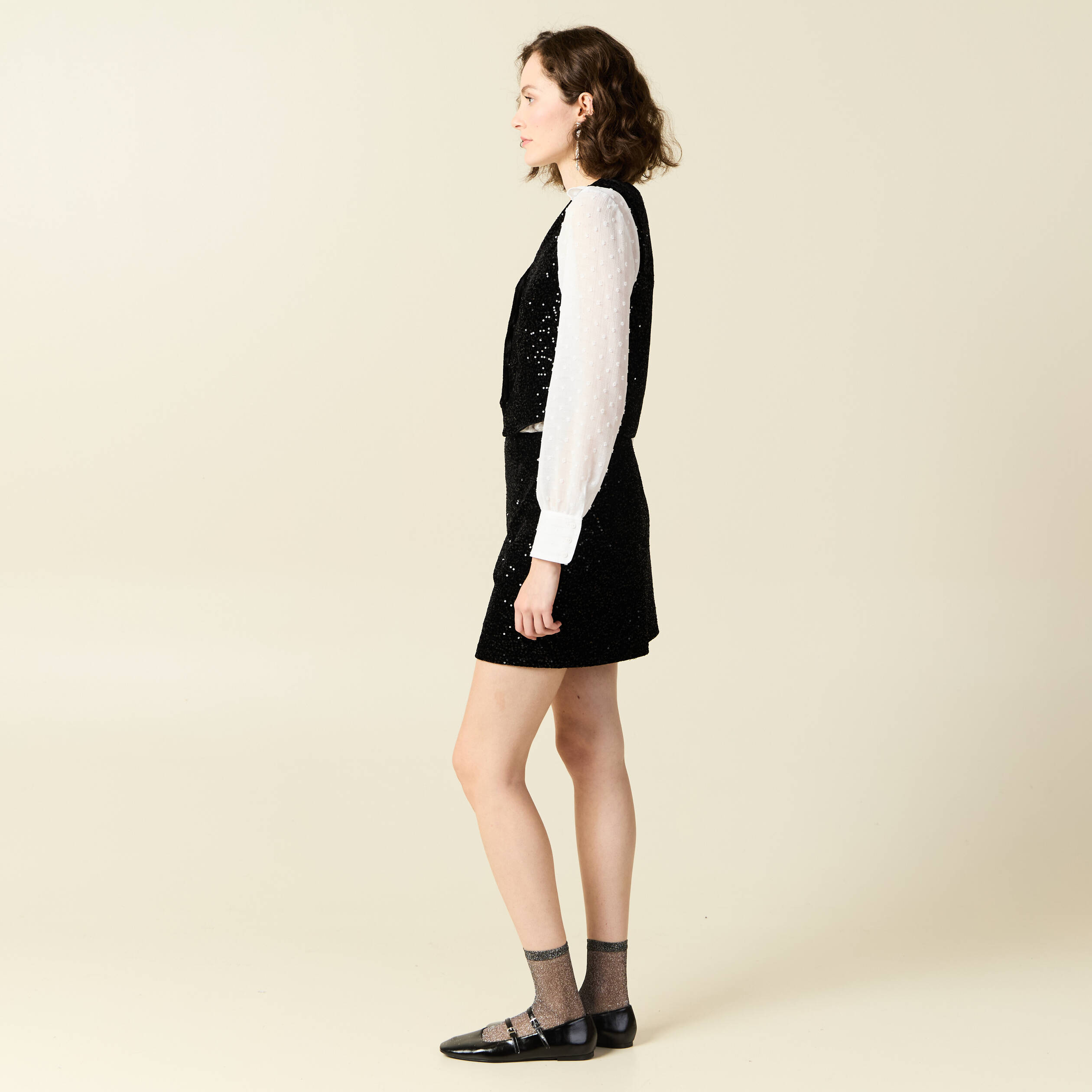 D&eacute;bardeur sans manches sequins noir femme