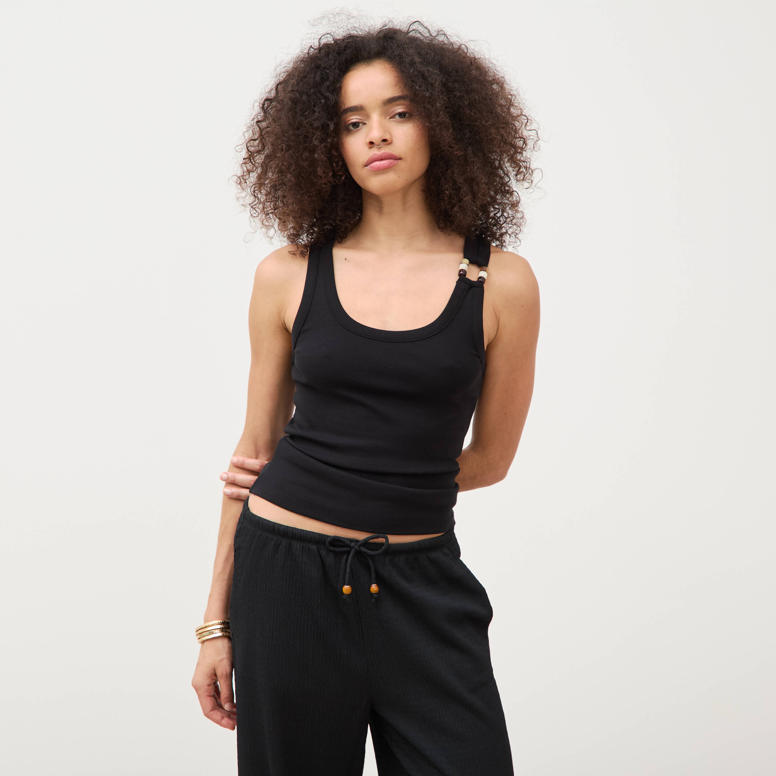 D&eacute;bardeur sans manches noir femme