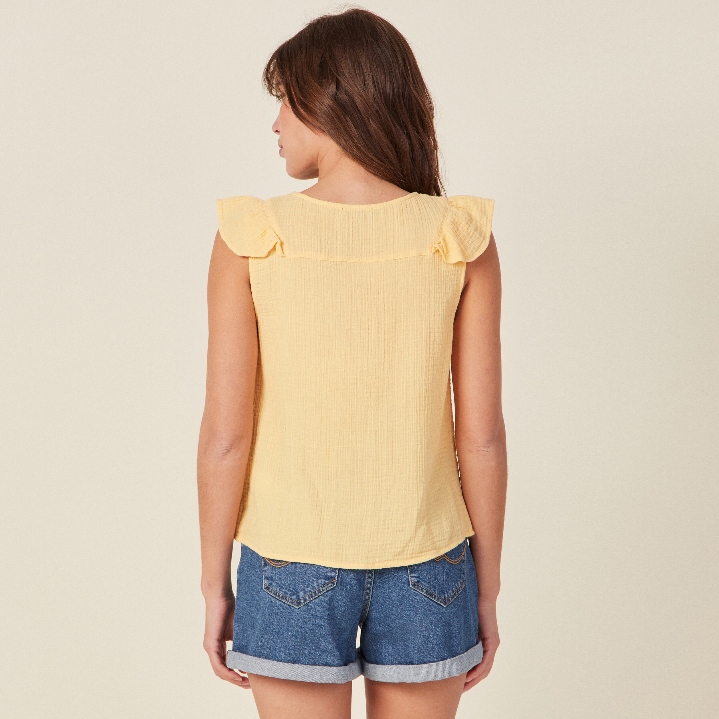 Chemise sans manches à volants jaune clair femme