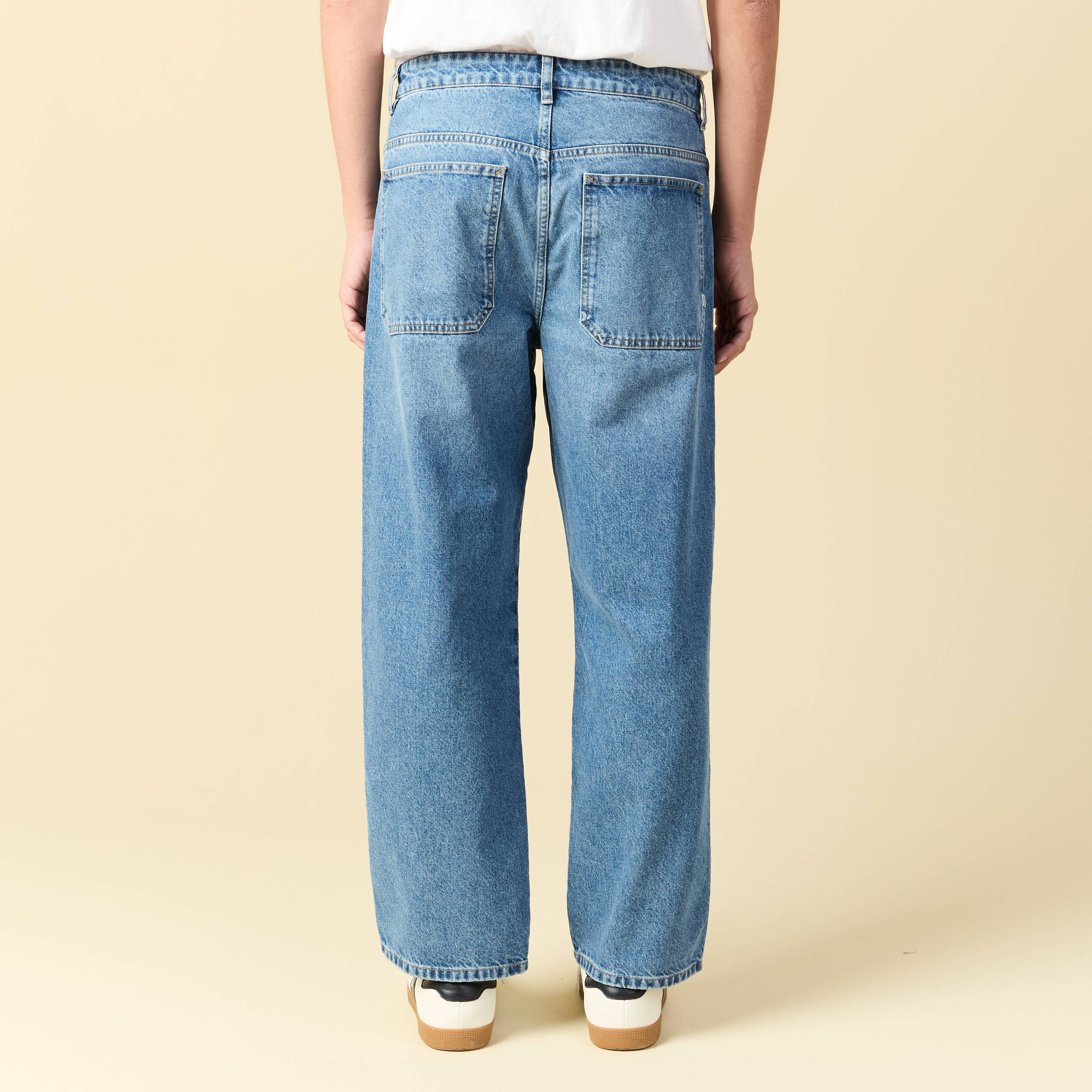 Jeans loose longueur 32 en coton denim bleach homme