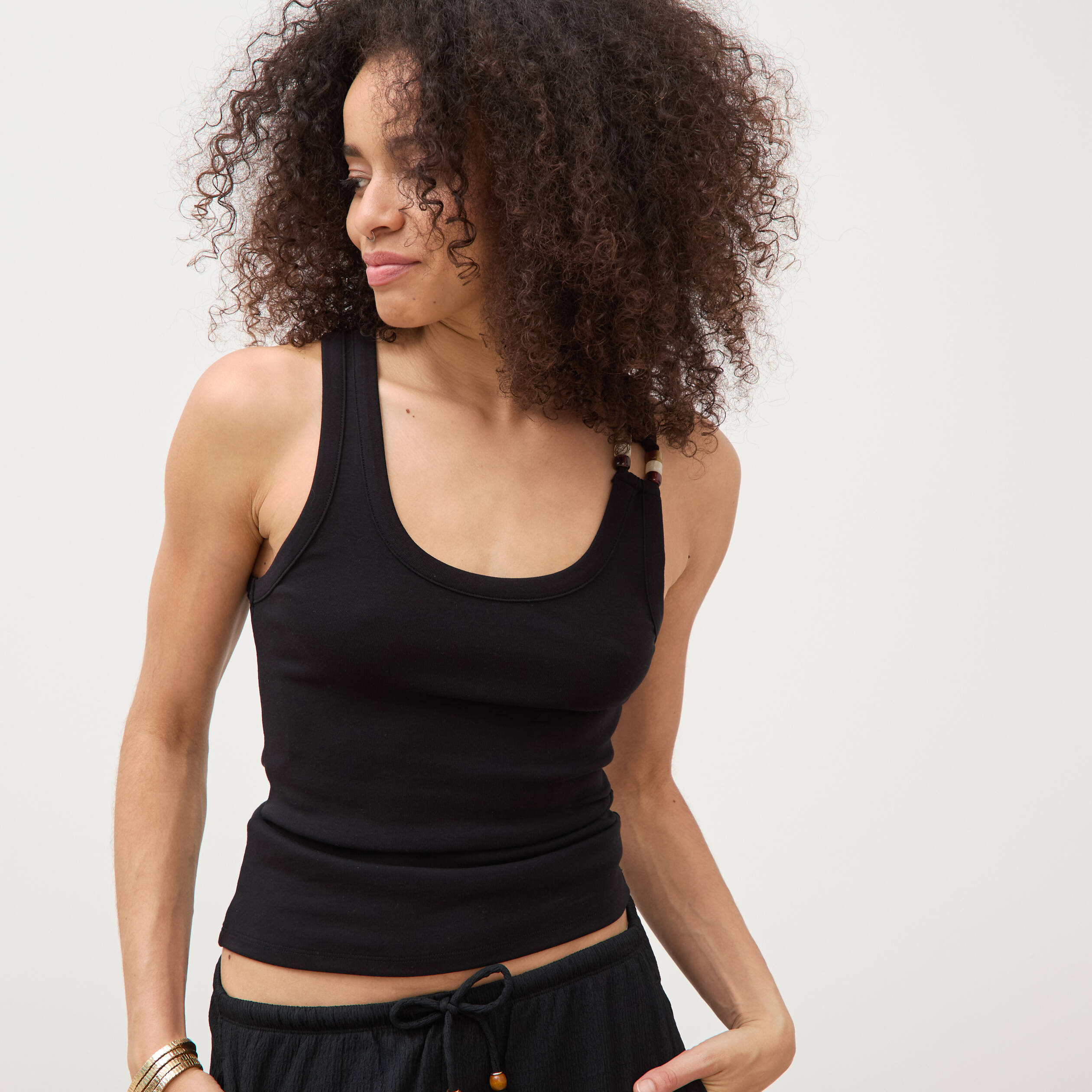 D&eacute;bardeur sans manches noir femme