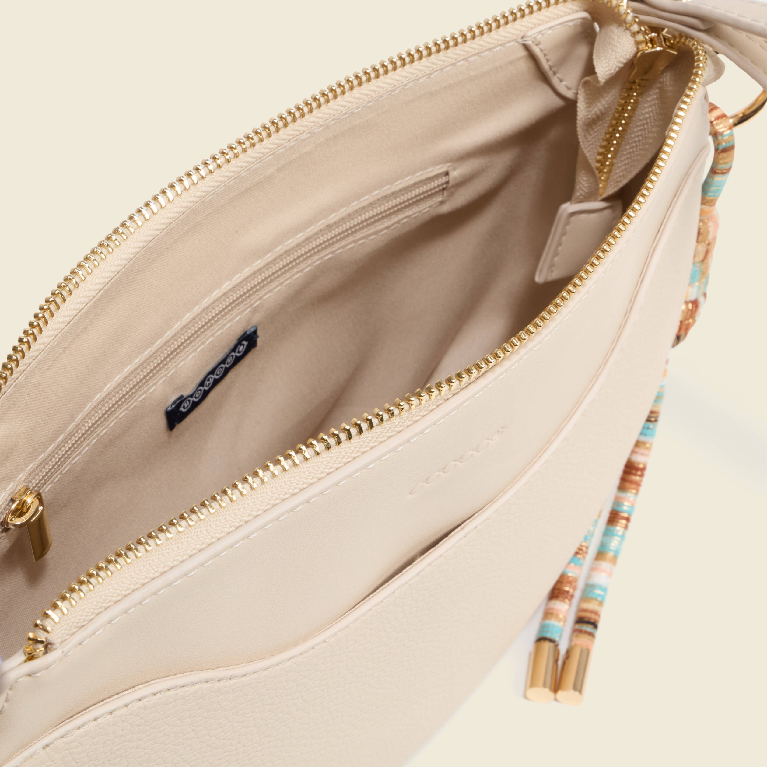 Sac demi-lune &agrave; bandouli&egrave;re ivoire femme