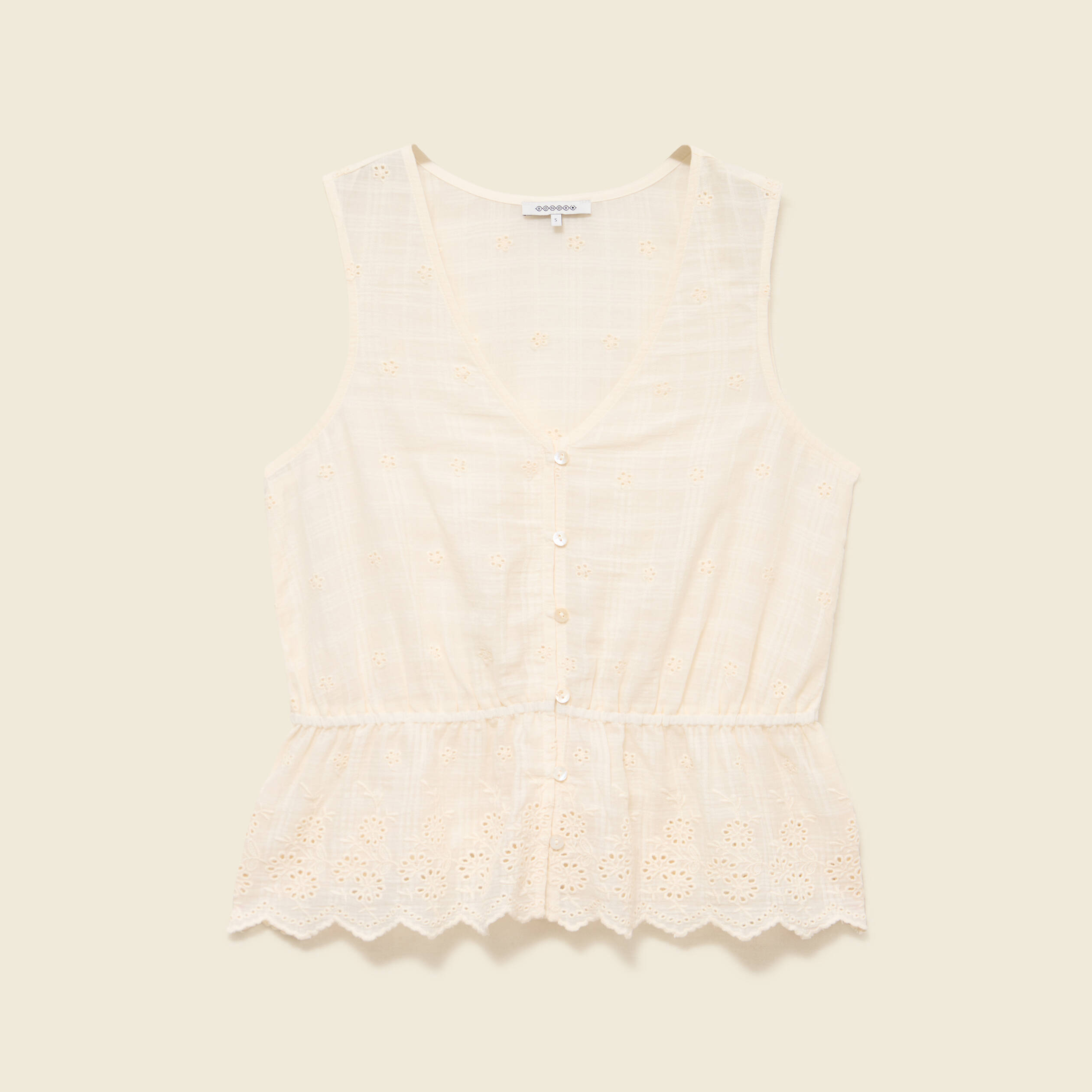 Top col v sans manches en coton creme femme