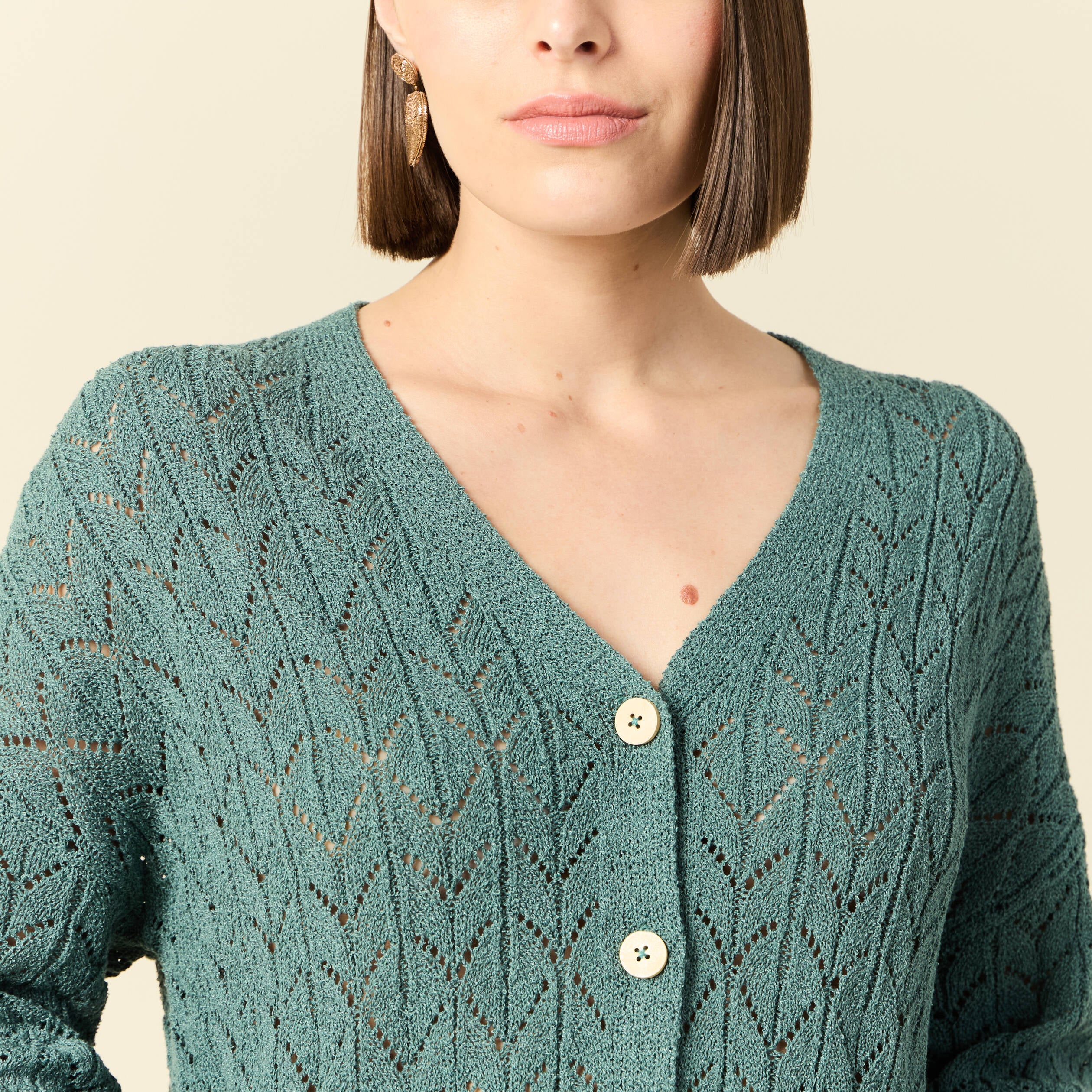 Gilet manches longues ajour&eacute; vert fonc&eacute; femme
