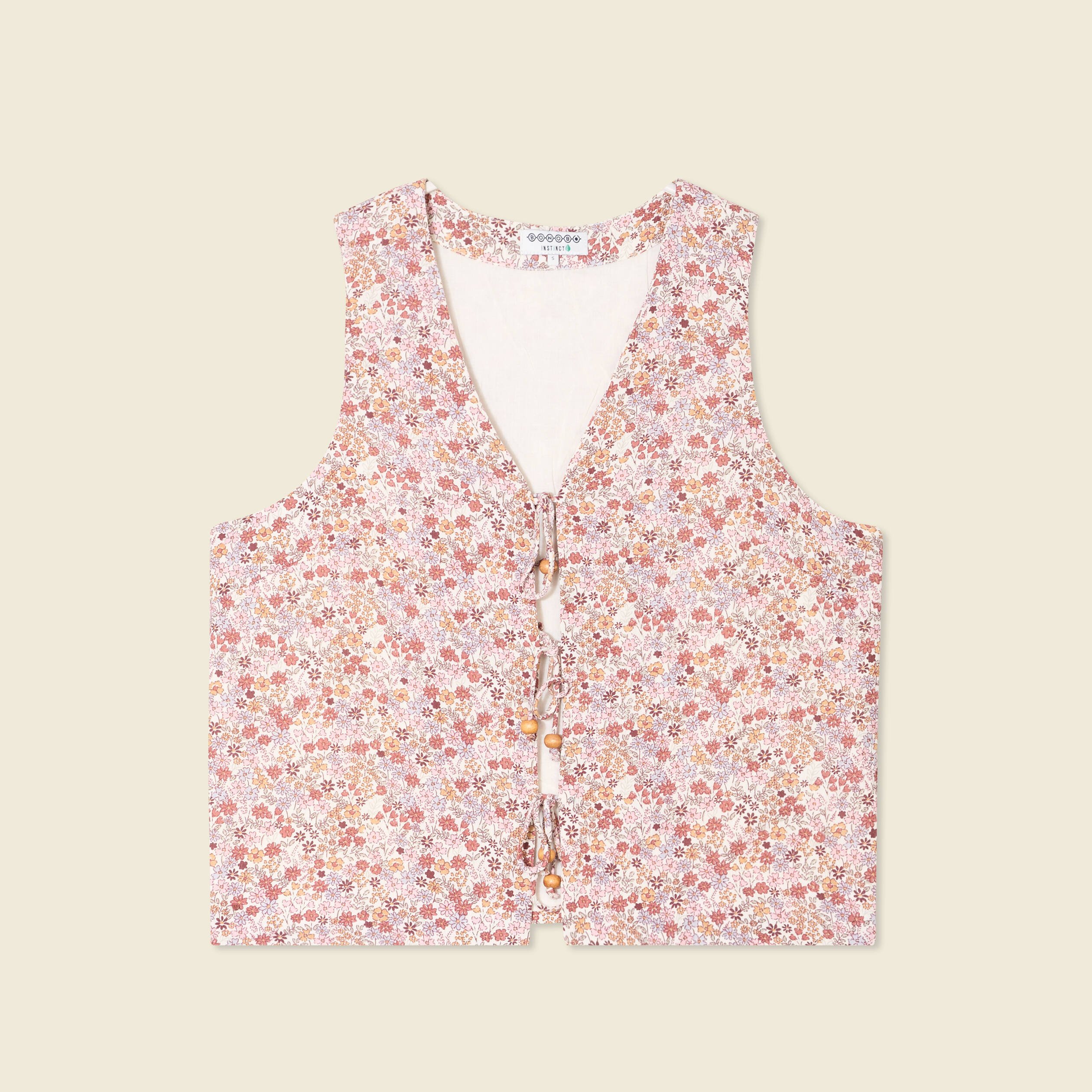 gilet sans manches noue ivoire femme Gilet sans manches noué ivoire femme