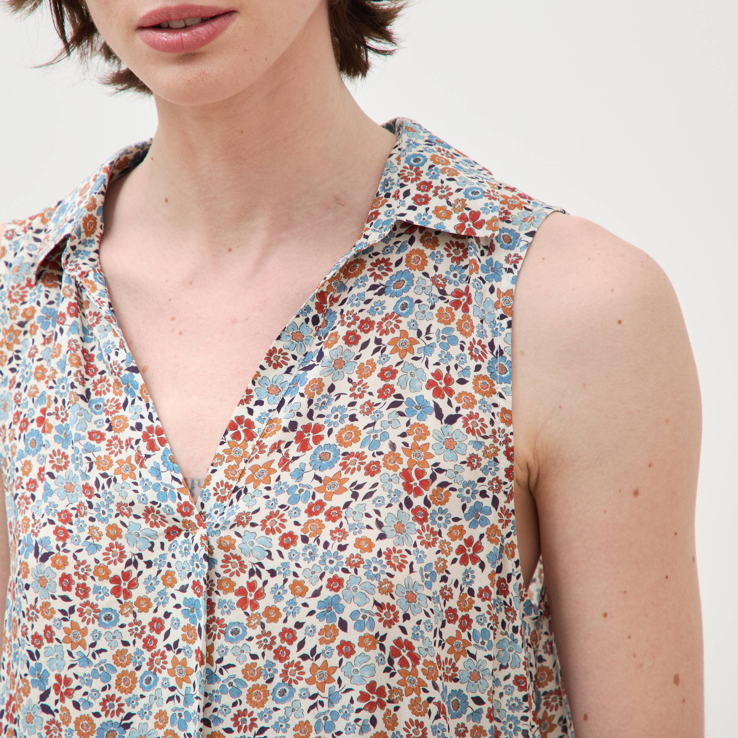 Blouse sans manches bleu gris femme