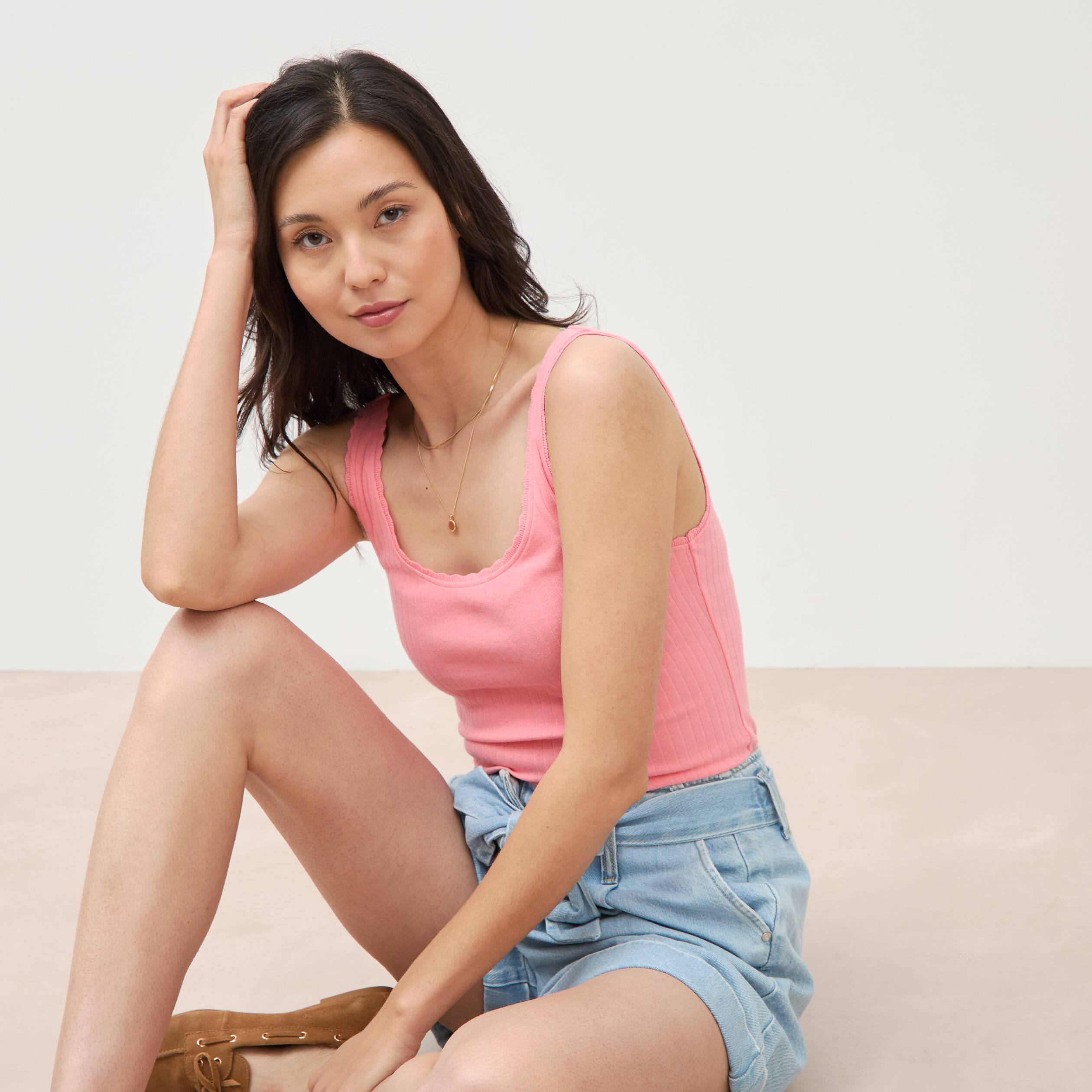 D&eacute;bardeur sans manches c&ocirc;tel&eacute; rose femme